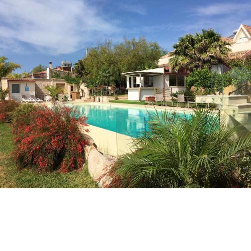 2 bedrooms appartement at Pozzallo 500 m away from the beach with shared pool enclosed garden and wifi
