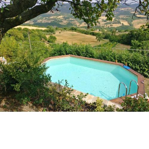 2 bedrooms appartement with shared pool and wifi at Assisi