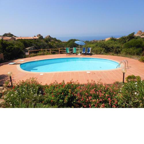 2 bedrooms house with sea view shared pool and furnished garden at Costa Paradiso 2 km away from the beach