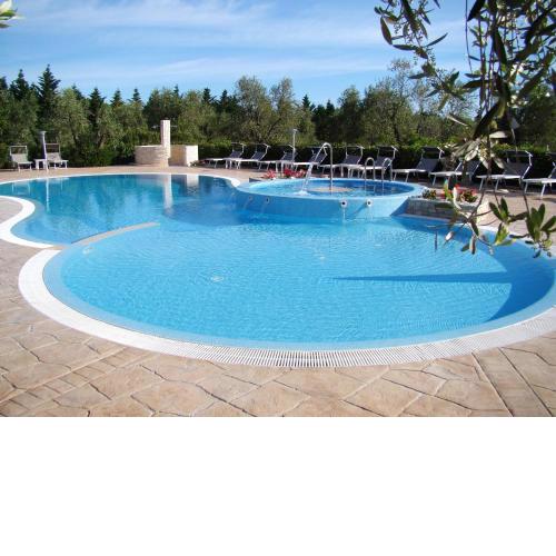 2 bedrooms house with shared pool furnished terrace and wifi at Vieste 1 km away from the beach