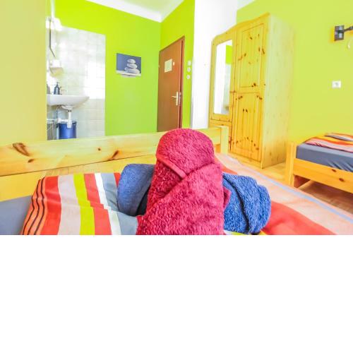 2 single beds room with shared bathroom