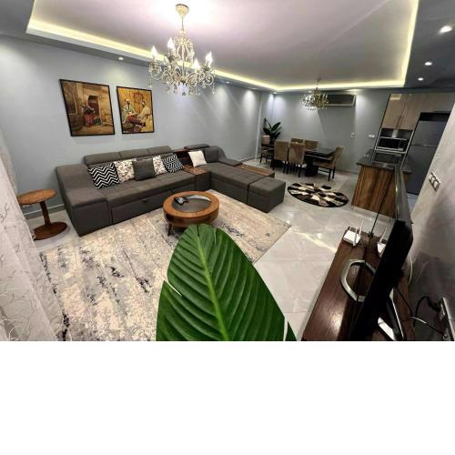 2BR Apt with Garden Pool beside AUC by Kemetland