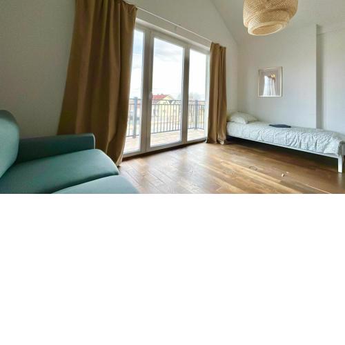 75 m2 Rooftop Apartment with Balcony