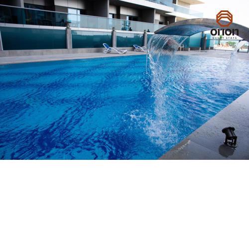 7th Floor Studio with Balcony & Canal View, 24hr Gym, Pool, Kids Play area, Male and Female Sauna, Steam room, 200m Running Track, Parking, WiFi, Prayer Room, Fully Furnished Apartment, long stay rates available by Orion Short Stays