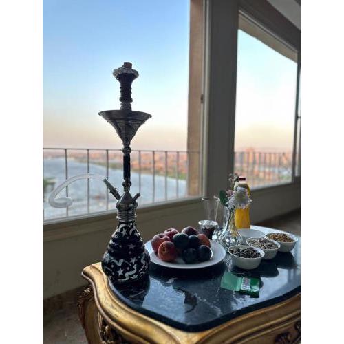 برج نايل كينج علي النيل شارع البحر الأعظم