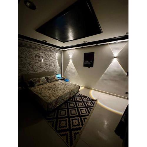 A private room exclusively for men, offering comfort and convenience for a relaxing stay