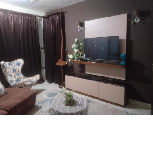A residential unit consisting of three rooms a living room a bathroom and a kitchen