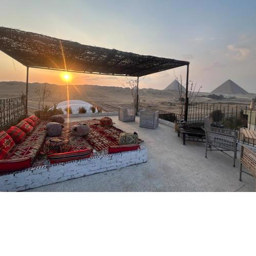 A room in a horse farm with pyramid view from terraces