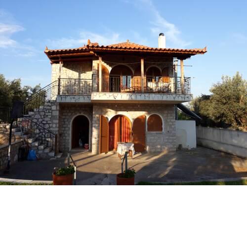 A STONE HOUSE IN THE COUNTRY