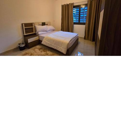 شقة فندقية عصرية بأجواء مريحة وتجربة استثنائية في مدينتي A stylish apartment for a unique and comfortable stay in madina