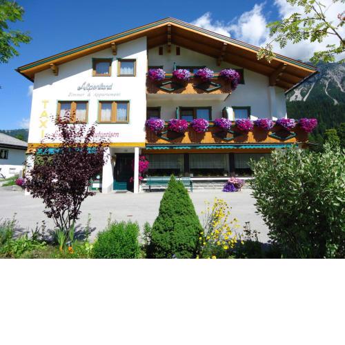 Alpenland Zimmer & Apartment