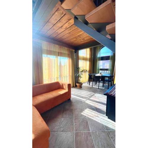 Altana - loft sulla città