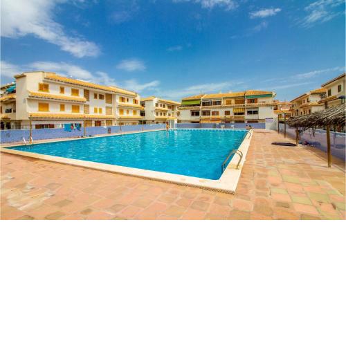 Amazing apartment in SANTA POLA with Outdoor swimming pool, WiFi and 1 Bedrooms