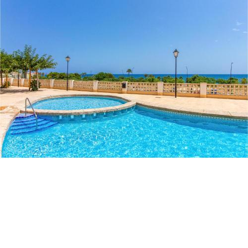 Amazing apartment in Villajoyosa with Outdoor swimming pool, WiFi and 2 Bedrooms