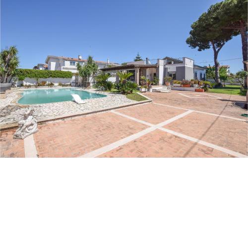 Amazing home in Anzio with Outdoor swimming pool, WiFi and 2 Bedrooms