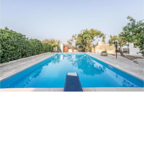 Amazing home in Modica with Outdoor swimming pool, WiFi and 4 Bedrooms