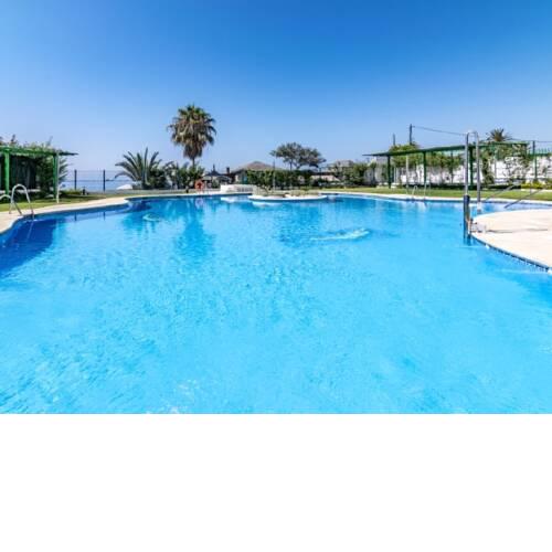 Apartamento en la playa con piscina comunitaria