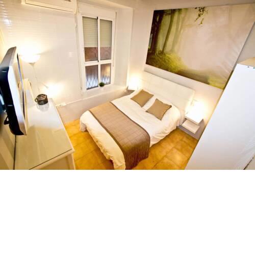 Apartamento ROMÁNTICO. 2 TV. WIFI y Climatización