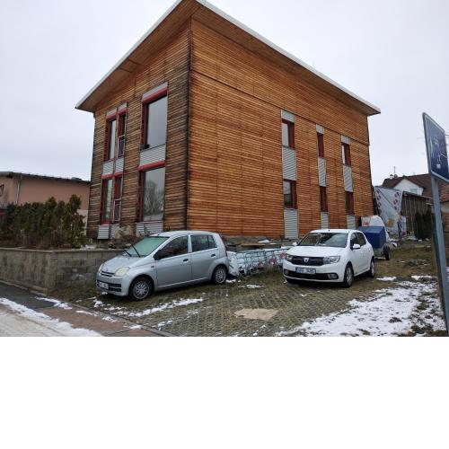 Apartmán v dřevěném domě