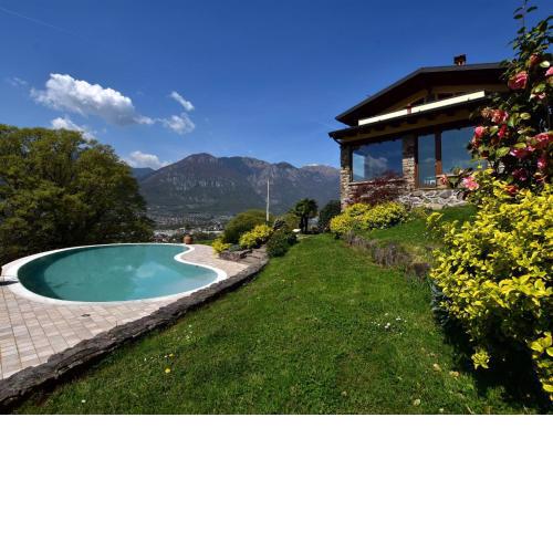 Apartment in 2 floor villa with swimming pool equipped garden and lake view