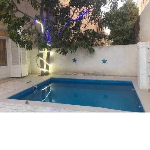 Apartment in a Villa with a private pool and a garden