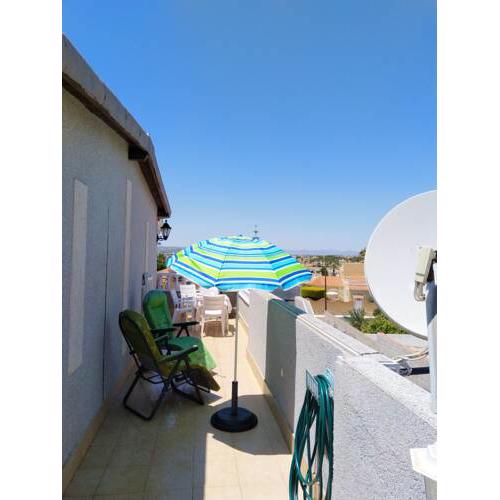 Apartment with 2 bedrooms in El Chaparral with wonderful sea view shared pool furnished terrace 3 km from the beach