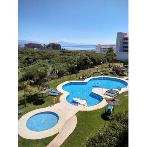 Apartment with 2 bedrooms in Manilva with wonderful sea view shared pool enclosed garden 100 m from the beach
