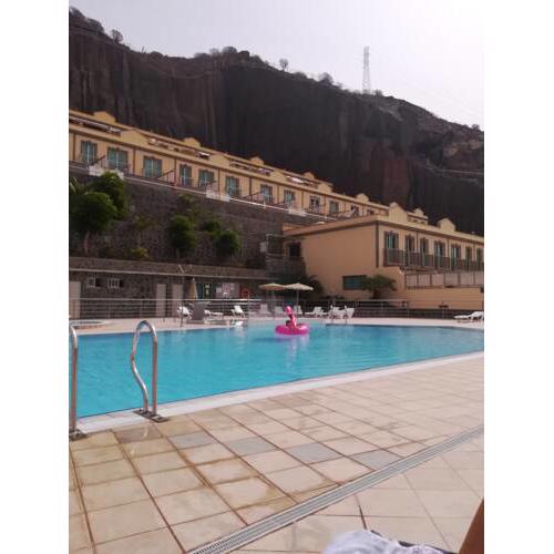Apartment with 2 bedrooms in Mogan with wonderful mountain view shared pool furnished terrace 2 km from the beach
