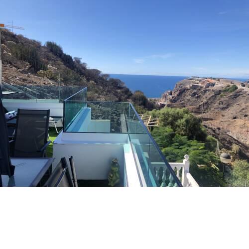 Apartment with 2 bedrooms in Mogan with wonderful sea view shared pool furnished garden
