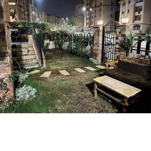 apartment with Garden & Private access in Gardenia City Compound for families only