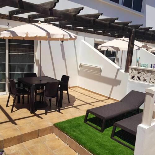 Apartment with one bedroom in Corralejo with shared pool and furnished terrace