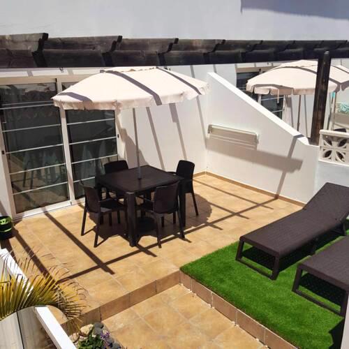 Apartment with one bedroom in Corralejo with shared pool and furnished terrace