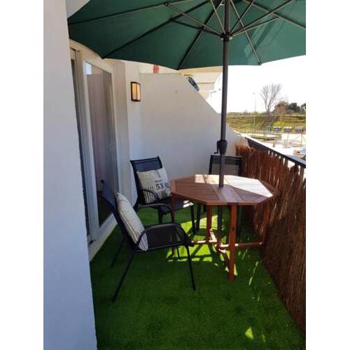 Apartment with one bedroom in Empuriabrava with wonderful lake view and furnished terrace 50 m from the beach