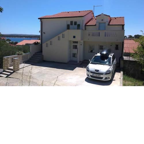 Apartments with a parking space Banjol (Rab) - 14134