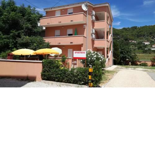 Apartments with a parking space Barbat (Rab) - 11472