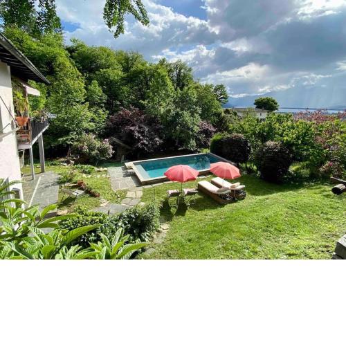Appartamento con piscina giardino e natura