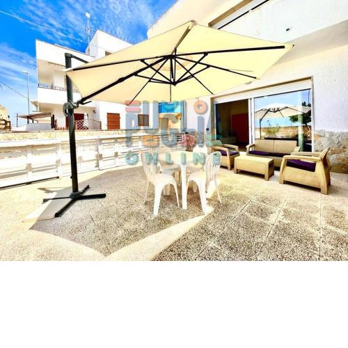Appartamento La Torre fronte mare piano terra