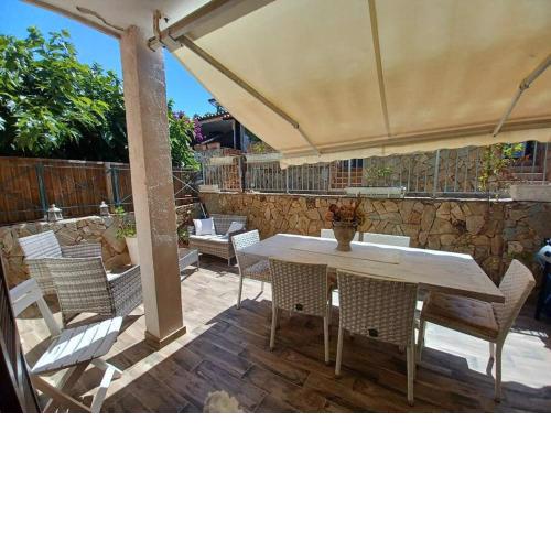 Appartamento rifinito con giardino mattonato