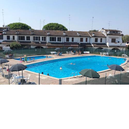 Appartamento Sole con giardino e piscina