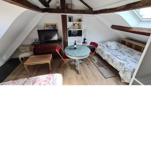Appartement Cœur de Paris avec vue sur les toits