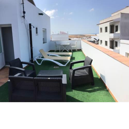 Arco - Virgen Apartamentos y Habitación