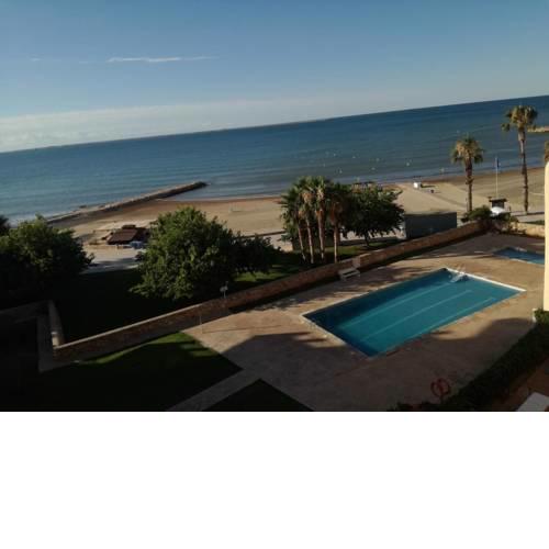 Atico primer linea de mar con piscina