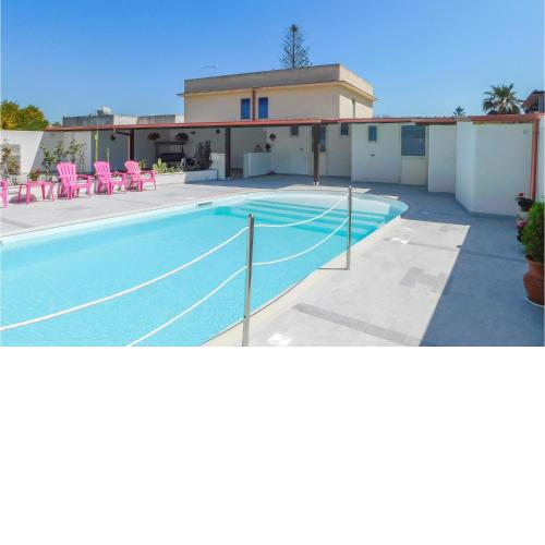 Awesome apartment in Ispica with Outdoor swimming pool, WiFi and 2 Bedrooms