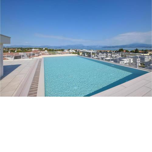 Awesome apartment in San Benedetto di Lugan with Outdoor swimming pool and 2 Bedrooms