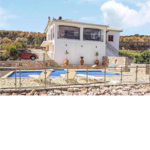 Awesome home in Koroni with Outdoor swimming pool, WiFi and 4 Bedrooms