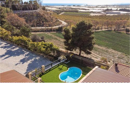 Awesome home in Motril with WiFi, Outdoor swimming pool and 4 Bedrooms
