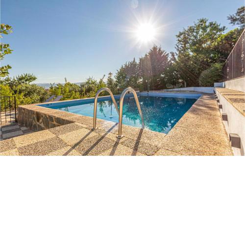 Awesome home in Nigüelas with Outdoor swimming pool, WiFi and 4 Bedrooms