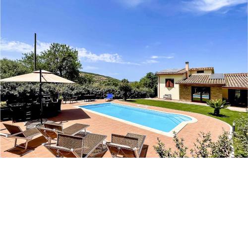 Awesome home in Nuxis with Outdoor swimming pool, WiFi and 3 Bedrooms