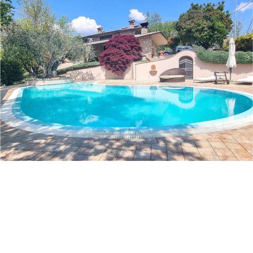 Awesome home in Trestina with Outdoor swimming pool, Sauna and 4 Bedrooms