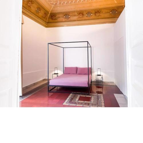 B. Sicilian Charming Stay Historical Suite